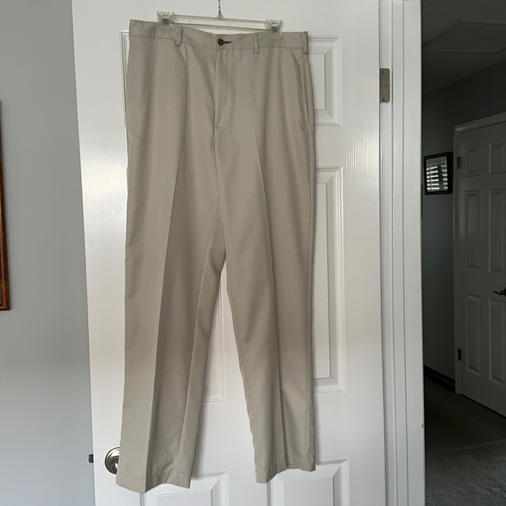 Men’s light weight beige slacks.